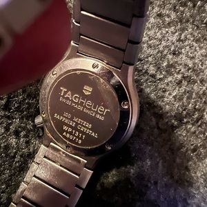 Gently used older Tag H woman’s stainless steel watch